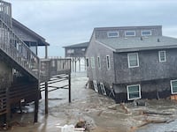 Houses Collapse Into the Ocean as Hurricanes Rage Offshore