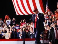 2020-11-02T060641Z_78931207_RC2UUJ90HR1D_RTRMADP_3_USA-ELECTION-TRUMP_xa2ey3