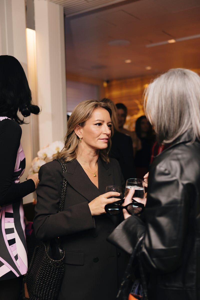 Author and MSNBC correspondent Katy Tur speaks with guests at the Power 100 luncheon.