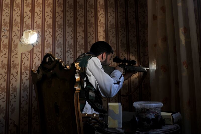 articles/2012/10/19/on-syria-s-frontlines-sniper-hunts-sniper/muse-syria-snipers-tease_efcsxy