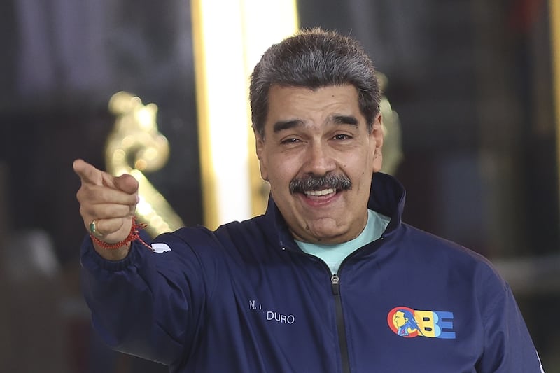 Venezuela's President Nicolas Maduro greets during the student day celebrations at Miraflores palace in Caracas, Venezuela on November 21, 2025.