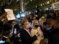 Rand Paul in crowd of protesters near White House