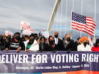 2022-01-17T153329Z_256656792_RC231S9ZZIJ3_RTRMADP_3_USA-MLK_ec3frp