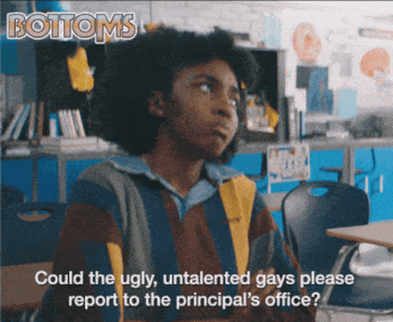 gif: Ayo Edibiris in a scene from 'Bottoms', text overlay reads: 'Could the ugly untalented gays please report to the principal's office"
