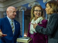 Vice President Kamala Harris prepares to swears in Sen. Mark Kelly (D-AZ) with his wife Gabrielle Giffords in the old senate chamber for the Ceremonial Swearing on January 03, 2023 in Washington, DC.