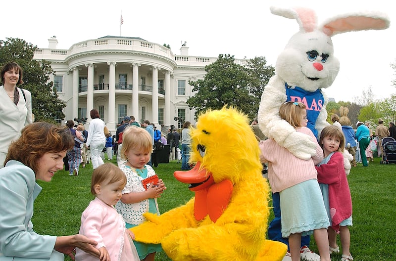 In a tradition that dates back to 1878, children take part in Easter festivities that included rolling Easter eggs, hearing stories and hugging cartoon characters on the South Lawn of the White House April 21, 2003 in Washington, D.C.