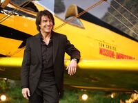 TOPSHOT - US actor Tom Cruise poses on the red carpet by a plane upon arrival for the Global Premiere of "Mission: Impossible - The Final Reckoning" at Leicester Square Gardens in central London, on May 15, 2025. (Photo by HENRY NICHOLLS / AFP) (Photo by HENRY NICHOLLS/AFP via Getty Images)
