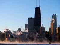The Chicago skyline as the steam fog rises off Lake Michigan in Chicago, Illinois, January 28, 2014.