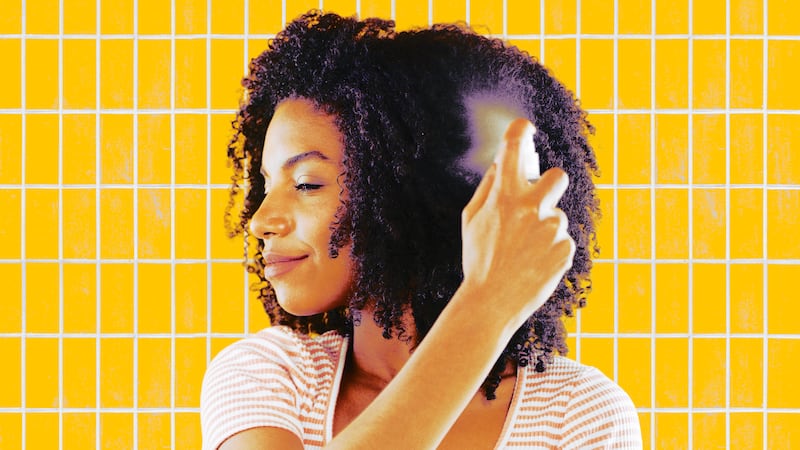 A photo illustration of a woman using hairspray.