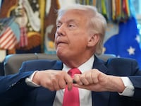 Donald Trump uncapping pen.