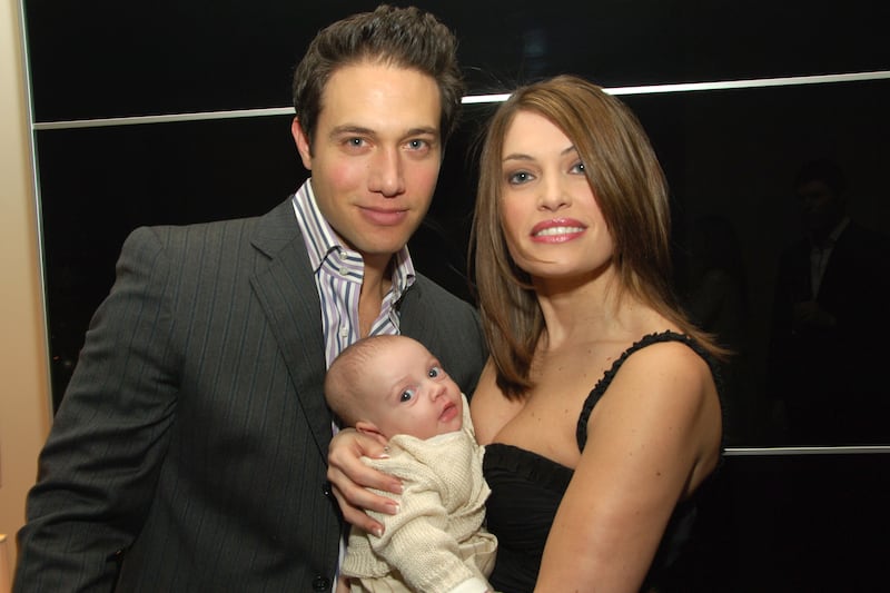 (L-R) Eric Villency, Ronan Villency and Kimberly Guilfoyle Villency attend KRUG Escape Artist Trunk presented by Eric Villency at One Central Park West on Dec. 14, 2006 in New York City.