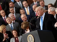 U.S. President Donald Trump celebrates with Congressional Republicans after the U.S. Congress passed sweeping tax overhaul legislation, on the South Lawn of the White House in Washington, U.S., December 20, 2017.