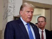 Donald Trump speaks to reporters outside of a Manhattan courtroom.