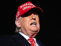 US President Donald Trump speaks to the press in the rain after landing on Air Force One at Joint Base Andrews in Maryland, May 30, 2025, after traveling to Pennsylvania to visit a US Steel plant.