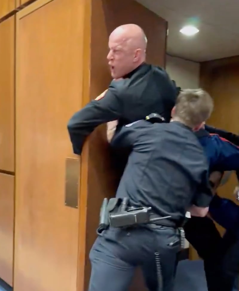 The moment McGinnis, with anguish oin his face, appeared to have his arm broken.