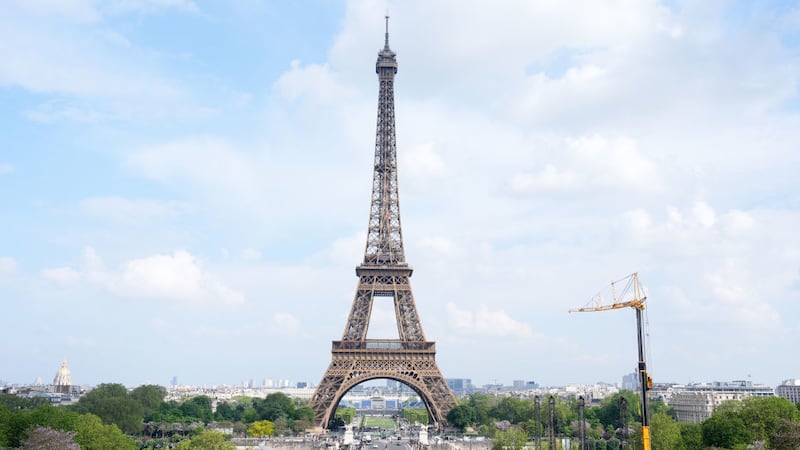 Russia is suspected of being involved in the appearance of five coffins at the foot of the Eiffel Tower, reports say.