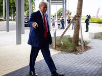 Republican presidential candidate, former U.S. President Donald Trump arrives to cast his ballot at Palm Beach County Supervisor of Elections