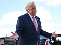 US President Donald Trump reacts to a question about Iran as he speaks to the press upon arrival at Miami International Airport in Miami, Florida, on March 27, 2026. Trump will deliver remarks at the FII PRIORITY Summit in Miami Beach. (Photo by Mandel NGAN / AFP via Getty Images)