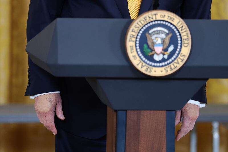 WASHINGTON, DC - MAY 06: U.S. President Donald Trump stands behind a podium as he speaks during a military mothers celebration in the East Room of the White House on May 6, 2026 in Washington, DC. President Trump and the first lady honored America's military mothers at the event ahead of Mother's Day. (Photo by Anna Moneymaker/Getty Images)