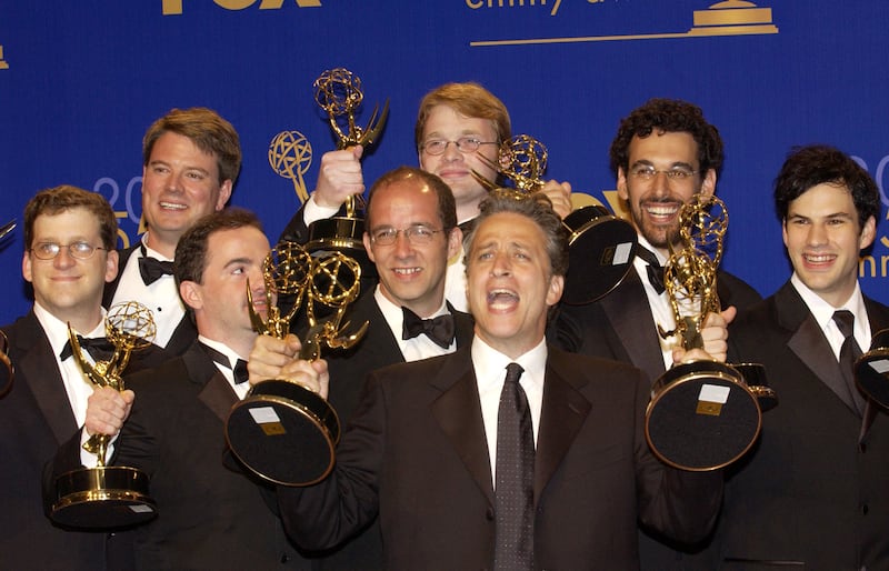 Stewart with 'The Daily Show' writers at the 55th Annual Primetime Emmy Awards in 2003. The Comedy Central show won the Emmy for Outstanding Variety, Music or Comedy Series.