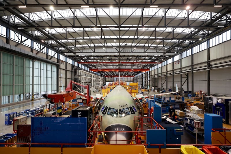 HAMBURG, GERMANY - JANUARY 18: Various new versions of the A320 passenger aircraft family are pictured at the A320 passenger plane assembly line at the Airbus factory are pictured during a visit of Federal Economy and Climate Protection Minister, Robert Habeck on January 18, 2022 in Hamburg, Germany. Habeck, co-leader of the German Greens party, is seeking to accelerate Germany's push towards its climate protection goals without decreasing the competitiveness of Germany's manufacturing sector. (Photo by Morris MacMatzen/Getty Images)
