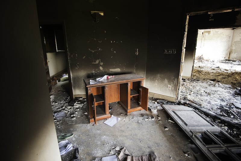 articles/2013/05/24/who-outed-the-cia-annex-in-benghazi/130523-lake-benghazi-tease_ukoelt