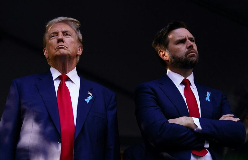 Donald Trump (L) and JD Vance attend a remembrance ceremony on the 23rd anniversary of the September 11 terror attack on the World Trade Center at Ground Zero, in New York City on September 11, 2024.