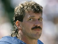 SAN DIEGO, CA - CIRCA 1990: Billy Ray Smith #54 of the San Diego Chargers looks on during an NFL football game circa 1990 at Jack Murphy Stadium in San Diego, California. Smith played for the Chargers from 1983-92. (Photo by Focus on Sport/Getty Images)
