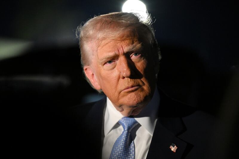 WEST PALM BEACH, FLORIDA - NOVEMBER 16: U.S. President Donald Trump speaks to reporters before boarding Air Force One on November 16, 2025 at Palm Beach International Airport in West Palm Beach, Florida. Trump spent the weekend at his Mar-A-Lago Club in Palm Beach, Florida. (Photo by Roberto Schmidt/Getty Images)