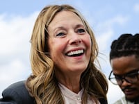 Dr. Amy Acton, Ohio Democratic gubernatorial candidate and former director of the Ohio Department of Health, is fitted with a microphone during a rally on April 28, 2026 in Cincinnati, Ohio.
