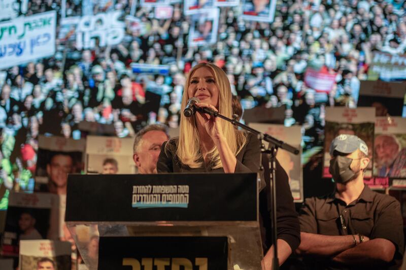 11 October 2025, Israel, Tel Aviv: US President Donald Trump's dauther Ivanka Trump speaks as her husband Jared Kushner (R) and US special envoy Steve Witkoff (L) look on during a gathering at Hostages Square in Tel Aviv. Photo: Ilia Yefimovich/dpa (Photo by Ilia Yefimovich/picture alliance via Getty Images)
