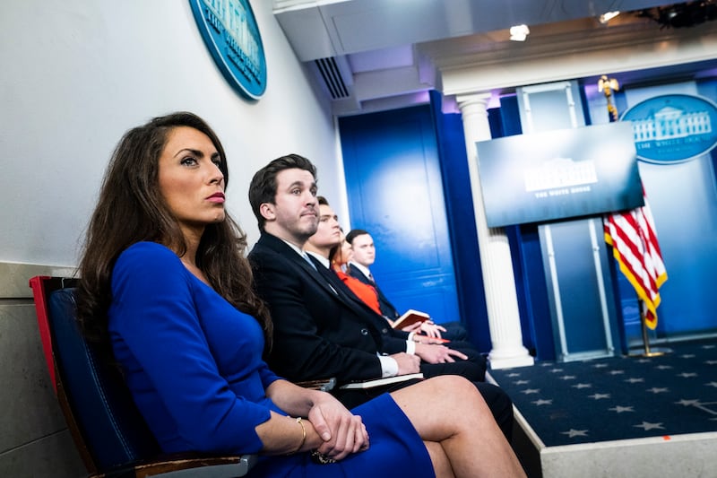 WASHINGTON, DC - MAY 1 : White House director of strategic communications Alyssa Farah listens as White House press secretary Kayleigh McEnany speaks in her first formal press briefing in the James S. Brady Press Briefing Room at the White House on Friday, May 01, 2020 in Washington, DC.