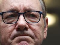 Kevin Spacey reacts to a judge’s ruling in a courtroom.