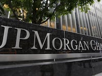 A sign that reads “JP Morgan Chase & Co.”