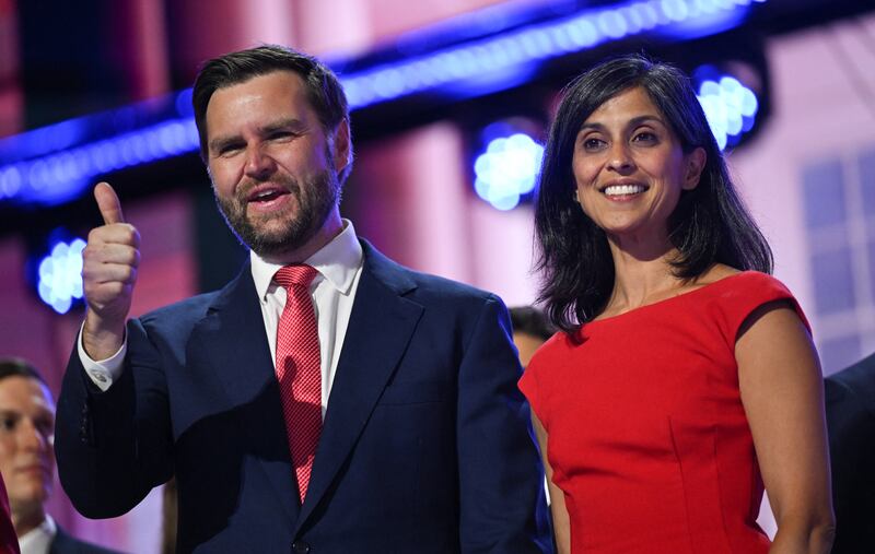 J.D. Vance and his wife Usha Vance stand on stage on the last day of the 2024 Republican National Convention at the Fiserv Forum in Milwaukee, Wisconsin, on July 18, 2024.