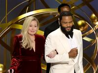 Christina Applegate and host Anthony Anderson at the Emmy Awards.