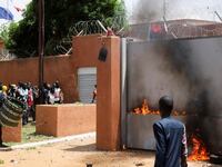"Pro-junta demonstrators gathered outside the French embassy, try to set it on fire before being dispersed by Nigerien security forces in Niamey, the capital city of Niger July 30, 2023.