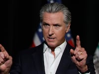 STOCKTON, CALIFORNIA - OCTOBER 22: California Gov. Gavin Newsom speaks to reporters after he participated in a fireside chat at the California Economic Summit on October 22, 2025 in Stockton, California. Gov. Newsom answered questions about the Trump administration's plans to deploy border patrol officers and the National Guard to San Francisco. (Photo by Justin Sullivan/Getty Images)
