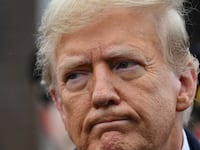 Former US President Donald Trump speaks to the press after attending the wake for New York Police Department (NYPD) Officer Jonathan Diller in Massapequa, Long Island, New York, on March 28, 2024.