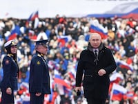 2023-02-22T140203Z_909859193_RC2DGZ9W2R5F_RTRMADP_3_UKRAINE-CRISIS-PUTIN-CONCERT_cr4kz4