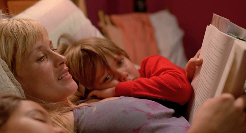 articles/2014/07/16/patricia-arquette-uncut-drunken-mischief-with-johnny-depp-true-romance-crush-and-boyhood/140709-boyhood-stern-embed1_ihcbzk