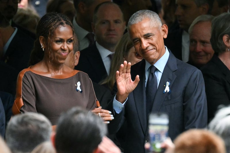 Former US President Barack Obama and former First Lady Michelle Obama attend the 25th anniversary commemoration of the September 11, 2001 attacks at the National September 11 Memorial in New York on September 11, 2026.