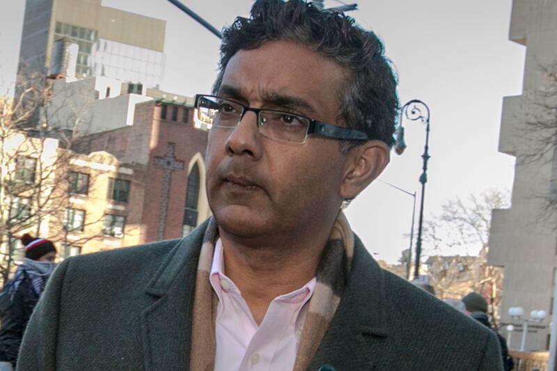 articles/2014/01/27/d-souza-s-never-ending-right-wing-hustle/140127-dinesh-dsouza-bouie-tease_jkum9t