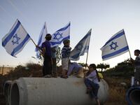 articles/2013/03/20/are-critics-of-israeli-occupation-getting-nervous/settler-kids-openz_d3kkm2