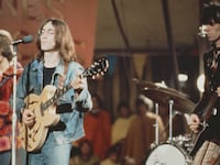 From left to right: Eric Clapton, John Lennon (1940 - 1980) and Keith Richards perform live on stage as The Dirty Mac on the set of the Rolling Stones Rock and Roll Circus at Intertel TV Studio in Wembley, London on 11th December 1968. (Photo by Mark Hayward Archive/Redferns)