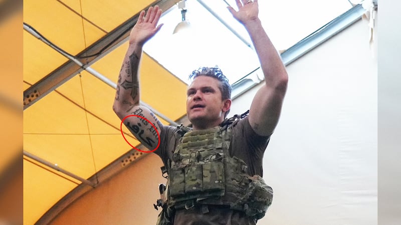 Secretary of Defense Pete Hegseth shows off a new tattoo on his right bicep that reads "kafir" in Arabic – a word that translates to "infidel."