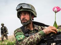 articles/2014/12/08/afghanistan-we-hardly-knew-you/141207-foreman-afghan-roses-tease_rplirt