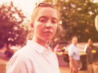 Screenshot of Sydney Sweeney's character in "Reality"