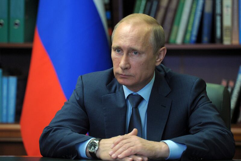 articles/2014/05/24/putin-responds-to-prince-charles-s-unacceptable-hitler-comparison/140723-putin-cheat_xsbxtn