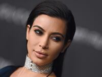 articles/2016/10/11/how-kim-kardashian-is-fighting-back-after-traumatic-paris-robbery/161011-zimmerman-kardashians-tease_upouzb